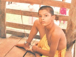Young Boy chained